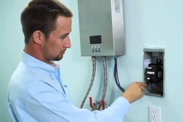 a Chipper specialist fixing a tankless water heater