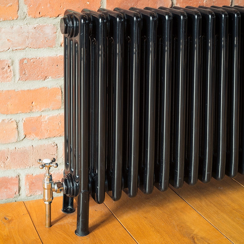 a cast iron radiator heater installed by Chipper Plumbing & Radiant